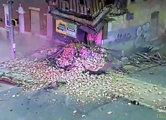 He ends up against a house that collapses during a car chase