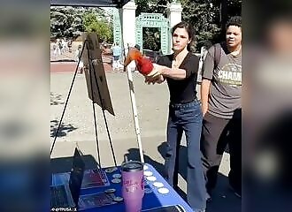 Left-wing activist throws tomato juice at Republican booth