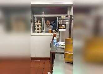 Disgruntled customers spit on an employee and wreak havoc on a McDonald's drive-thru