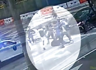 A policewoman watches a man being beaten without intervening (she was suspended)