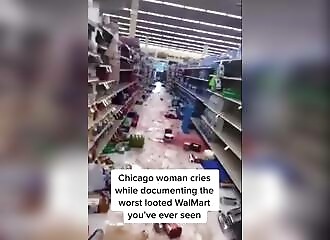 Woman cries as she discovers aftermath of Walmart store looting