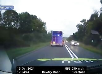 A motorist takes huge risks to escape from the police