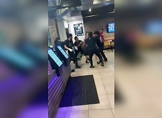 An idiot starts a fight over a paper cup at Taco Bell and gets mobbed