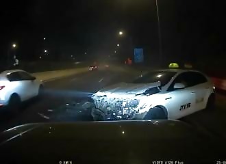 Two drivers destroy a cab by driving past it at breakneck speed