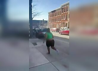 She kills a woman in the street because of jealousy