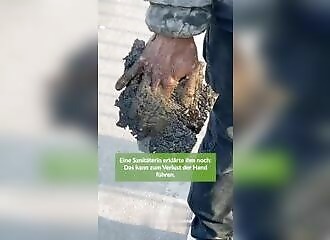  This environmental activist goes too far by sticking his hand in the road! 