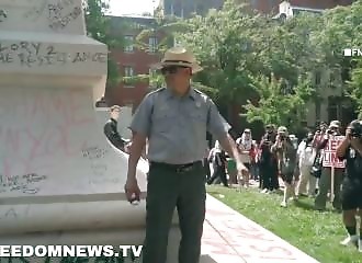 Pro-Hamas demonstrators assault a guard protecting the Rochambeau statue in Washington DC