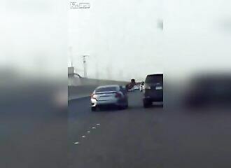  He goes out the window to damage a car during a road rage, karma takes care of the rest 