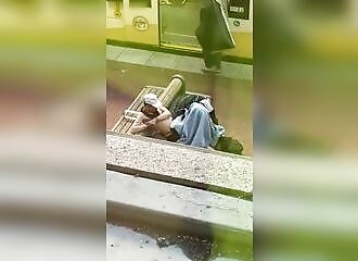 Homeless man caught getting a blow job in broad daylight!