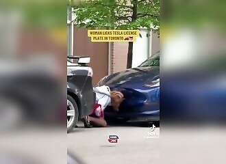 Woman filmed licking a Tesla plate in Toronto