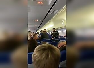 Man accused of being racist is attacked by 3 men on plane