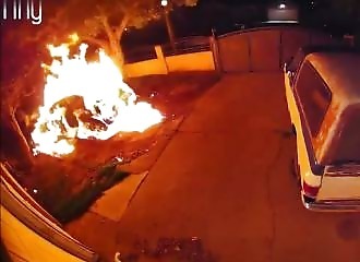 A man sets fire to himself by torching a car