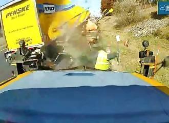 Motorway worker narrowly escapes a raging truck