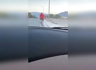 Young hit-and-run driver deliberately hits cyclist (Warning - shocking)