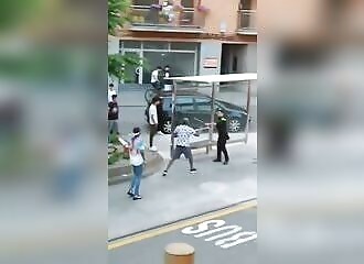 Spanish police attempt to break up brawl between Dominicans and Moroccans in Barcelona 