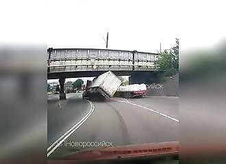 Truck flips over when driver takes a turn too fast