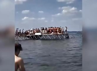 Dozens of University of Wisconsin students disappear into lake when pier collapses