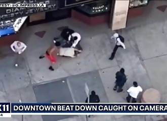 Truck driver gets beaten up in the street (Warning - shocking)