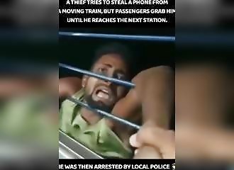  Thief tries to snatch phone from train 