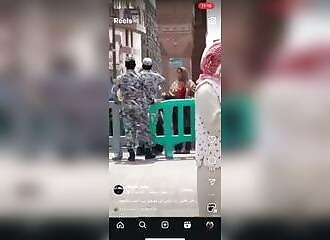 A woman slaps an agent in Mecca